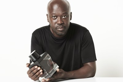 Sir David Adjaye with the decanter he designed for Gordon & MacPhail, comprising the oldest Scotch whisky ever bottled, the Generations 80-Years-Old from Glenlivet Distillery